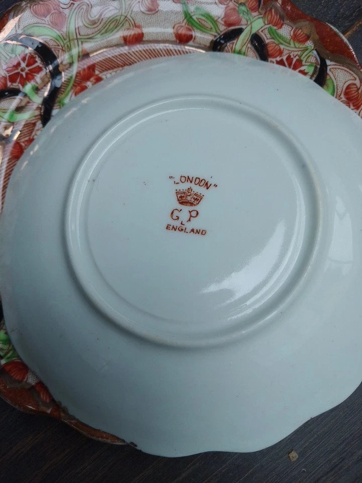 Backstamp of an antique Imari tea trio showing London GP England mark on the base of the ceramic plate