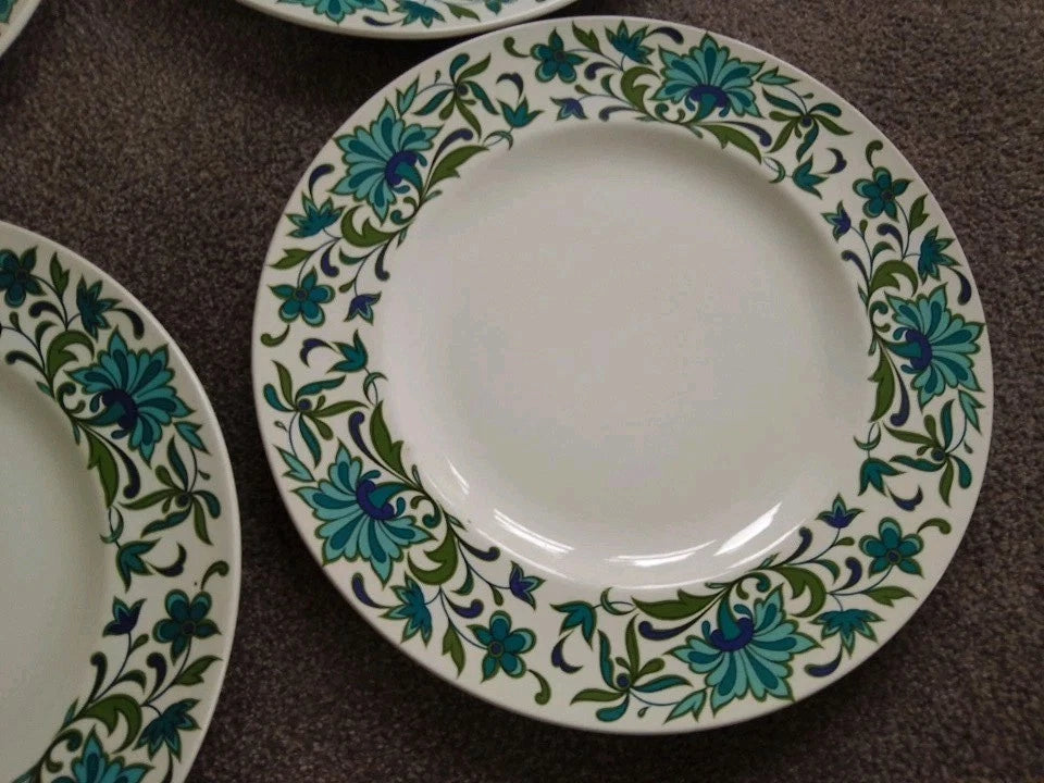 Midwinter Spanish Garden plates with blue and green floral pattern on white dinnerware