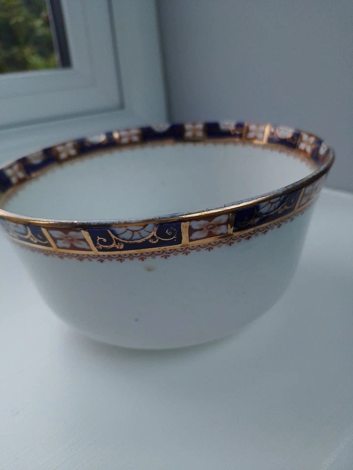 Royal Albert Imari style sugar bowl with intricate gold and navy patterned rim from Crown China collection