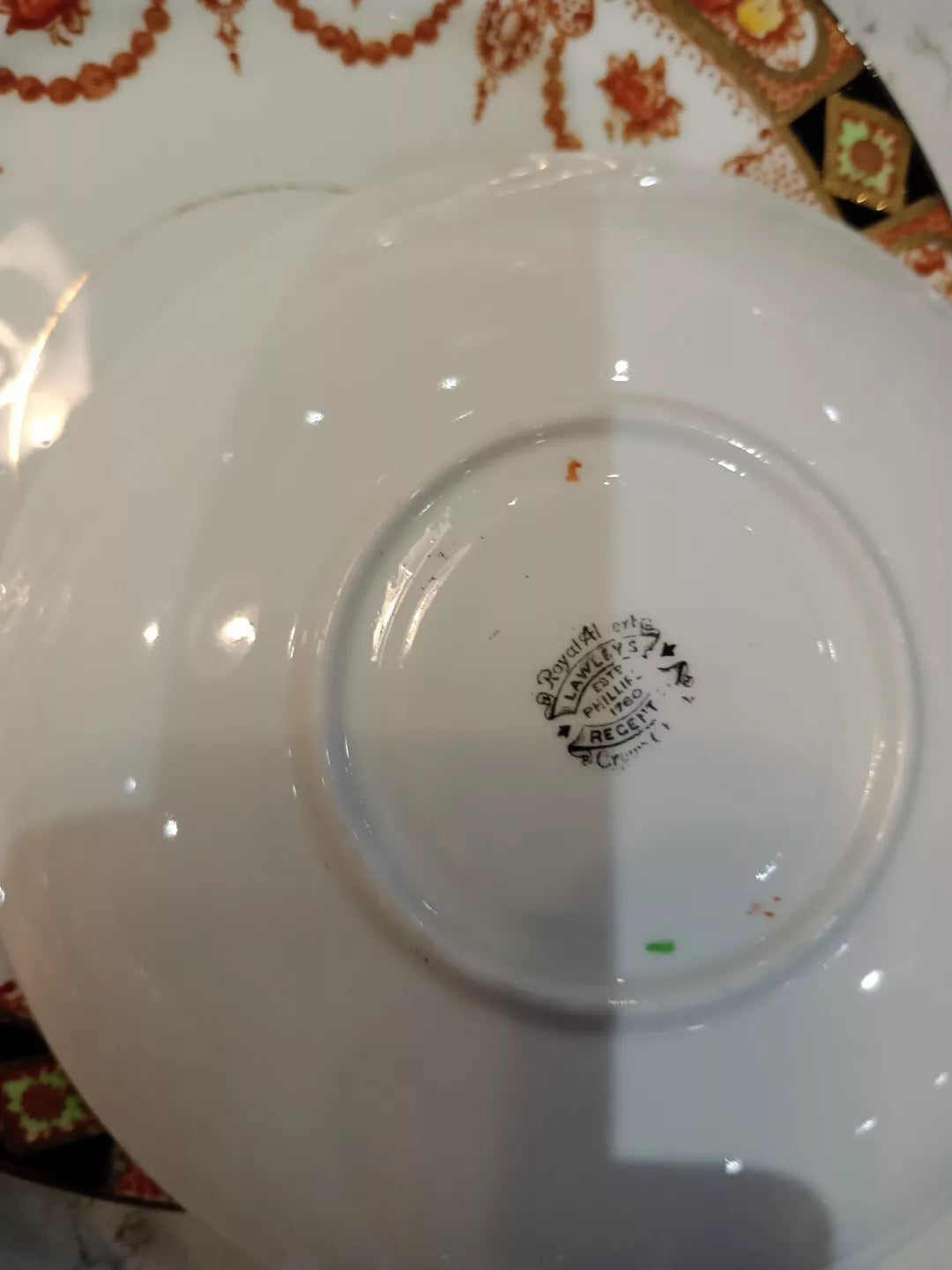 Backstamp on vintage Devon Black Lovain tea set Royal Albert plate showing maker's mark and pattern details