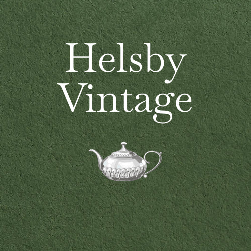 Logo of new vintage store Helsby with vintage teapot icon on green textured background