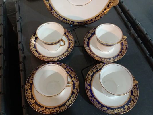 Adderleys cobalt blue tea set featuring fine china cups and saucers with gold floral detailing
