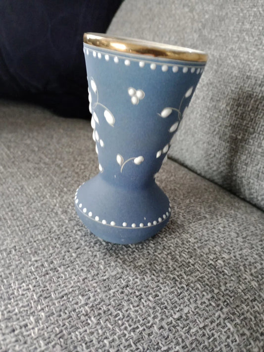 Alcobaca raised relief porcelain vase in blue with white floral details and gold rim collectible item