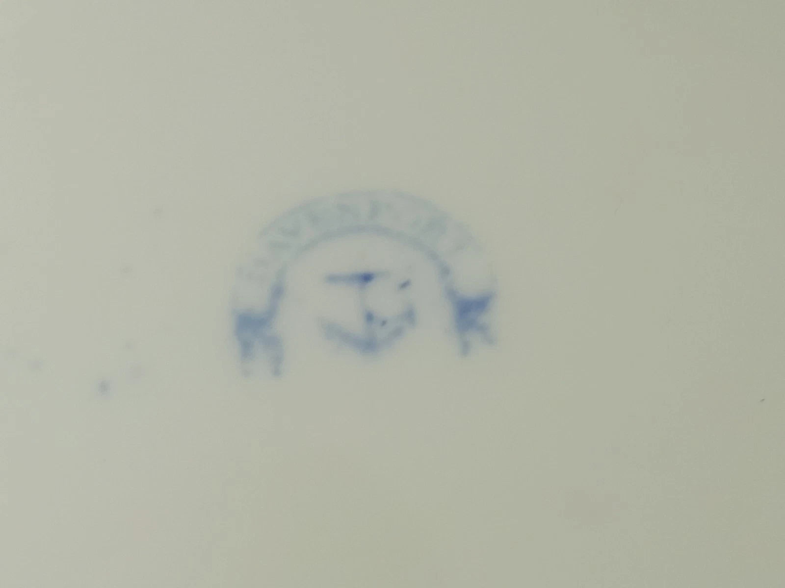 Close-up of Antique Davenport dessert set Tazza comport plates 1840 blue maker's mark stamp