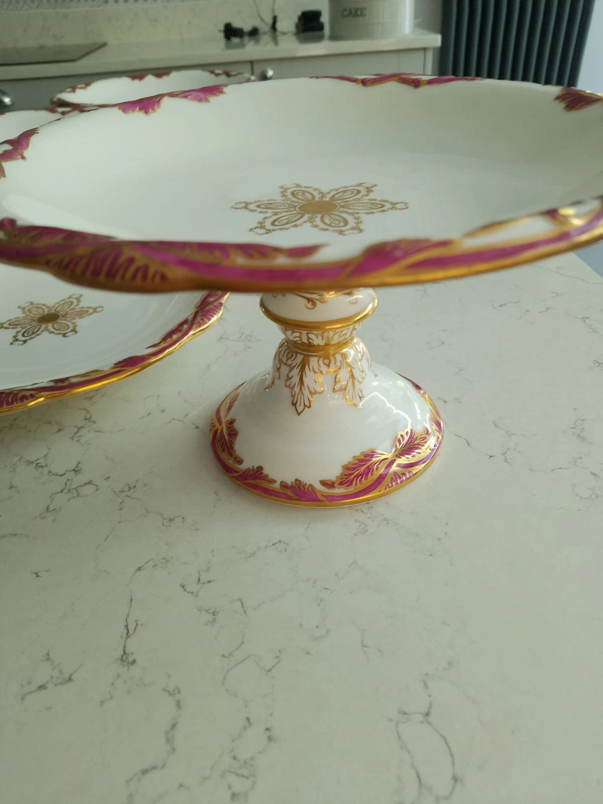 Antique Davenport dessert set Tazza comport plates 1840 with ornate gold and pink detailing on white porcelain