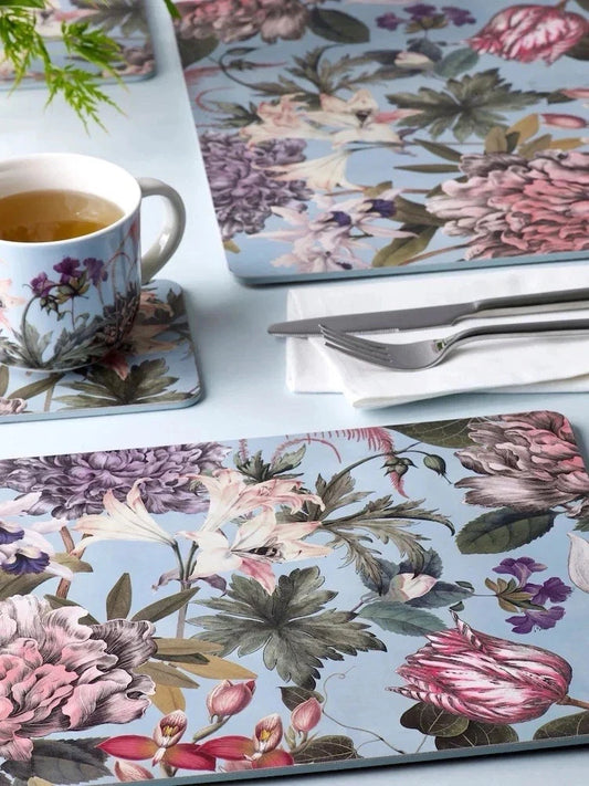 Botanic gardens Kew placemats coasters set with floral designs in soft pastel colours on kitchen table
