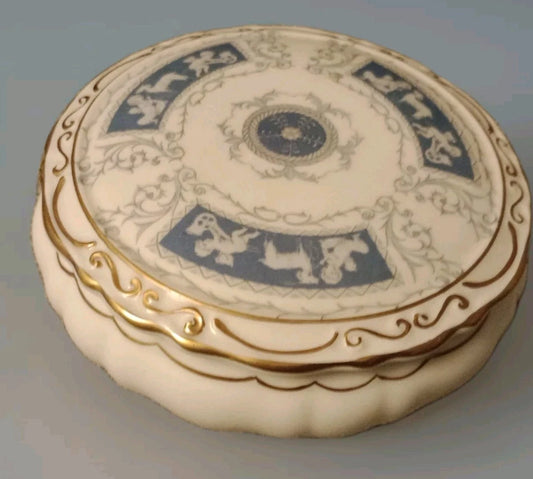Coalport Revelry powder box collectible with intricate blue and gold decorative design