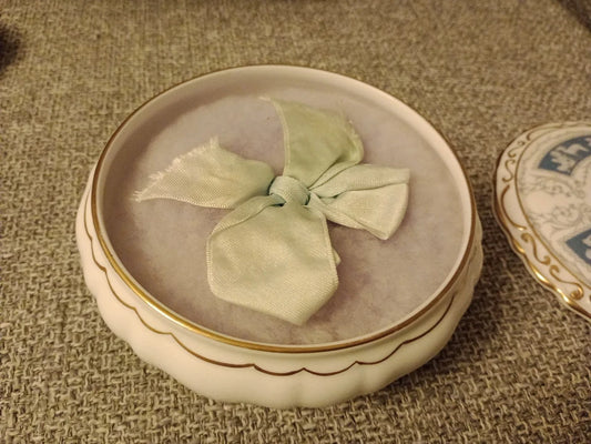 Coalport Revelry powder box with delicate gold trim and soft fabric interior for collectables