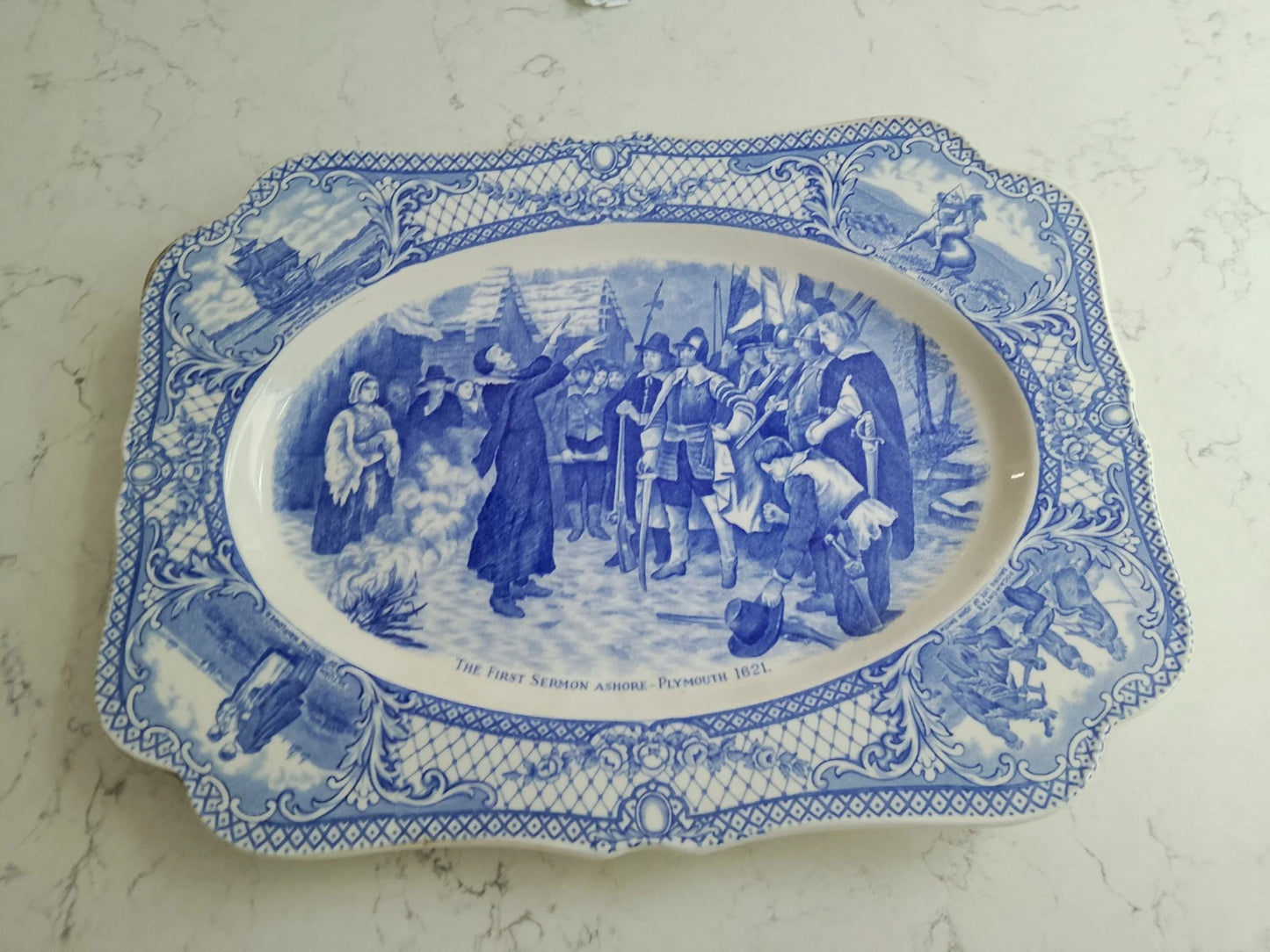 The First Sermon Ashore crown ducal plate featuring detailed blue and white historic scene collectible