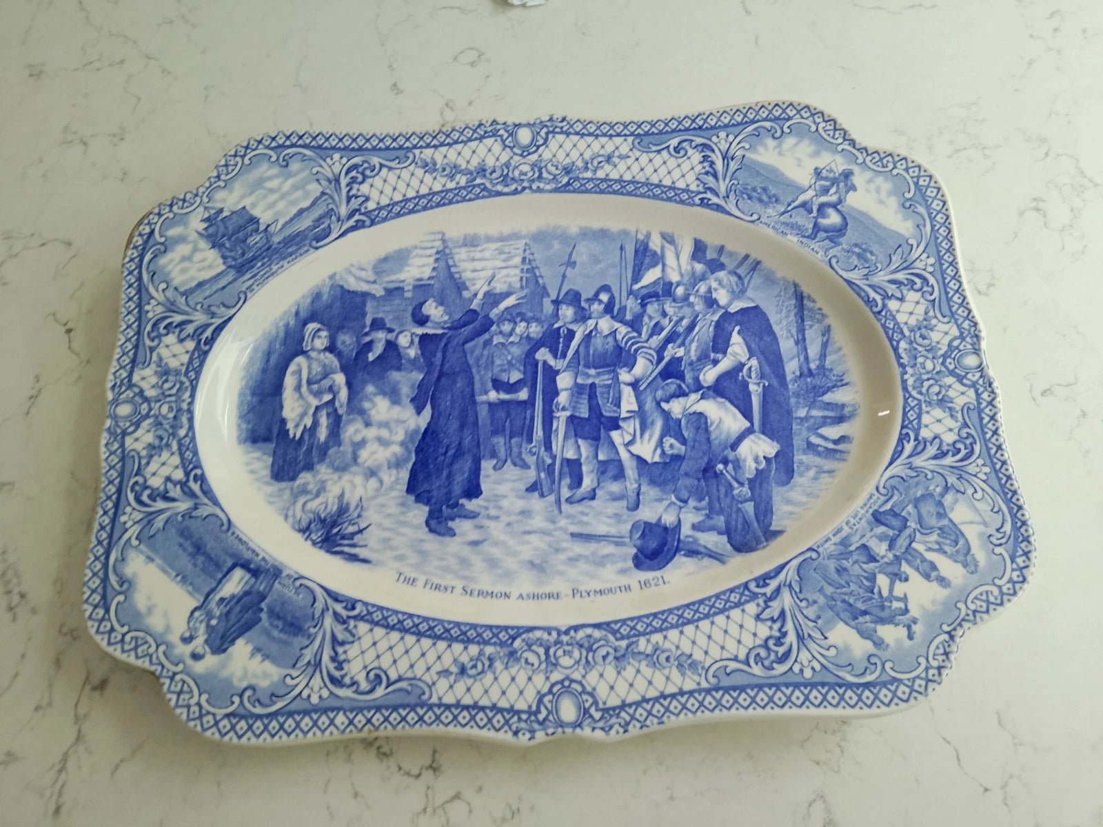 The First Sermon Ashore crown ducal plate featuring detailed blue and white historic scene collectible