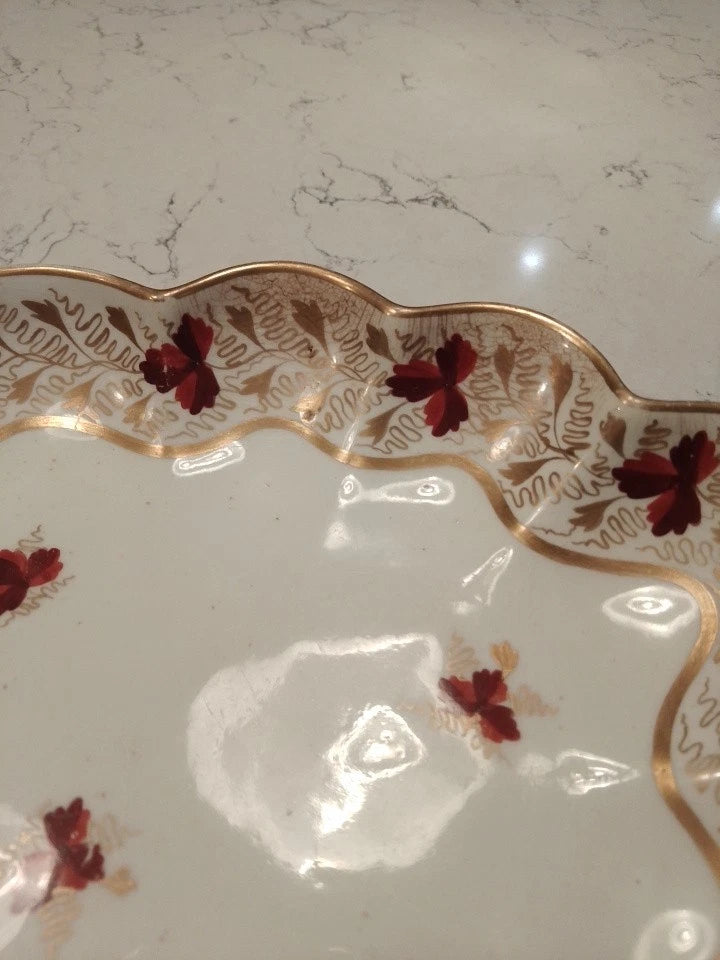 Derby lobed edged ceramic plate dish with red floral design and gold detailing on cream background