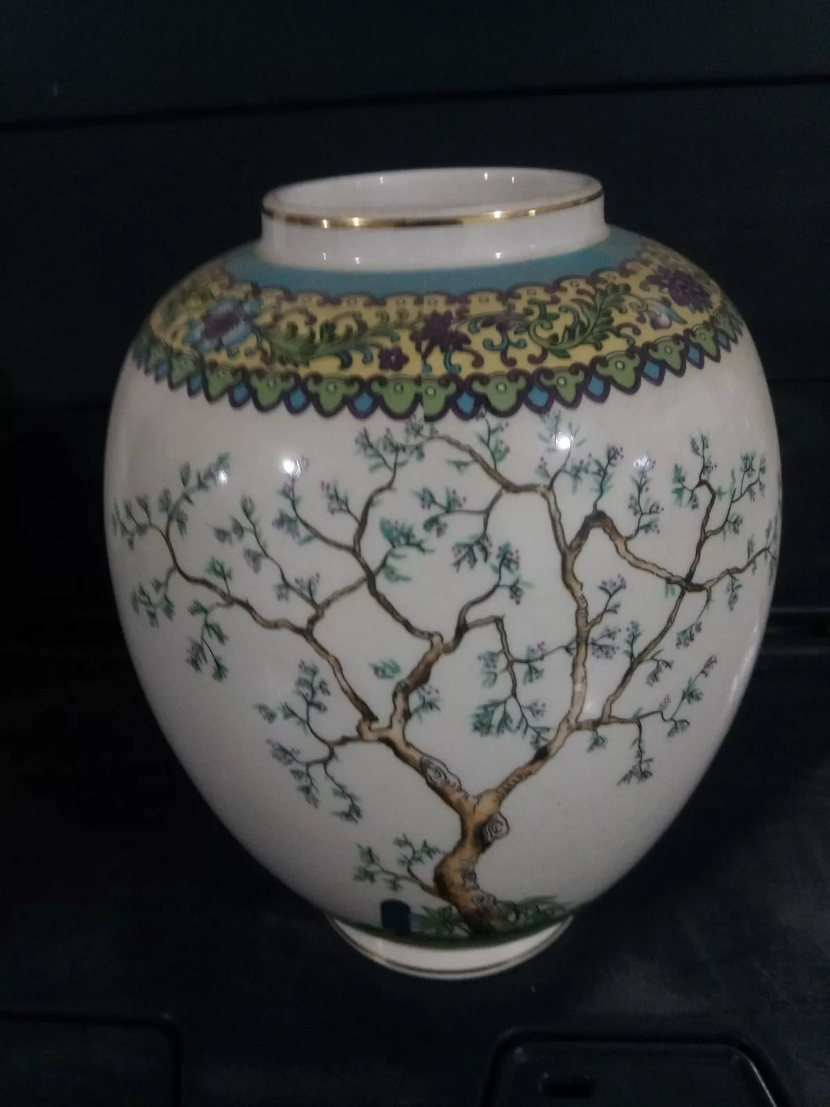 Unbranded Japanese famille rose vase with intricate tree and floral design on white porcelain
