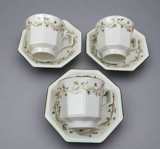 Johnson Brothers Eternal Beau cups and saucers with floral design and octagonal shape in white porcelain