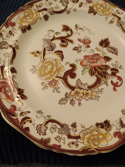 Masons Brown Velvet charger plate with detailed floral pattern in yellow and brown tones on cream background