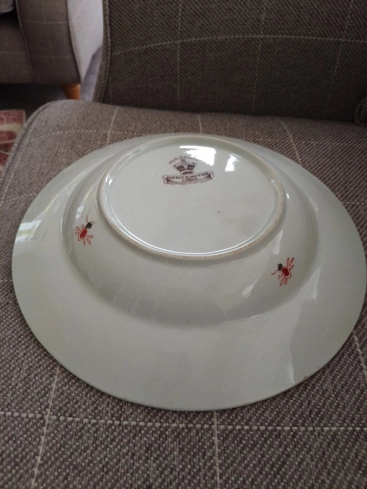 Back view of Masons Ironstone Imari soup plate showing maker's mark and floral details on antique ceramic