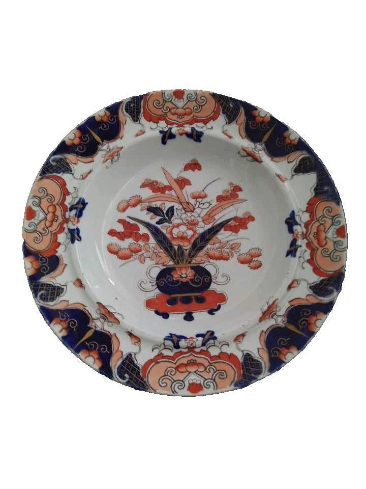 Masons Ironstone Imari soup plate with traditional floral and geometric patterns in blue and orange