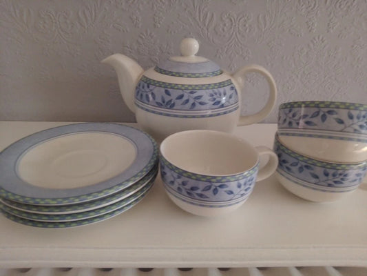 Royal Doulton Expressions Rivoli teapot with matching cups and plates in blue leaf pattern