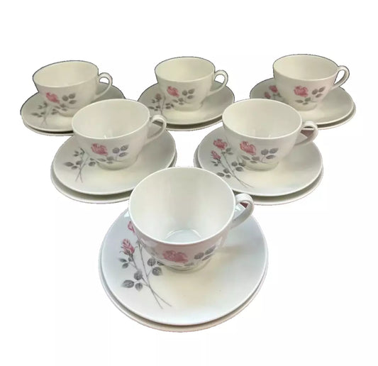 Royal Doulton Pillar Rose Trios tea set with cups and saucers featuring delicate pink rose design