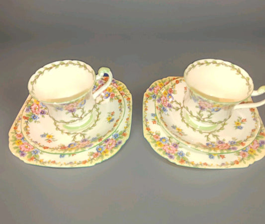 Royal Paragon bone china trio set with floral pattern featuring cup, saucer and side plate by Paragon