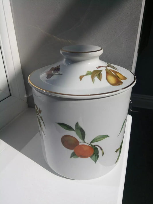 Royal Worcester Evesham biscuit jar with fruit design and gold trim on white ceramic kitchenware
