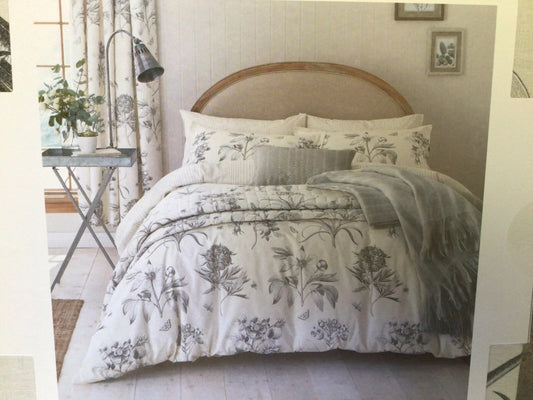 Sanderson Home double duvet cover set featuring elegant floral design in a cozy bedroom setting
