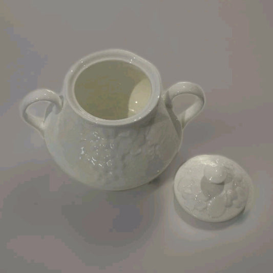 Wedgwood Strawberry and Vine sugar bowl in white porcelain with embossed fruit design and two handles